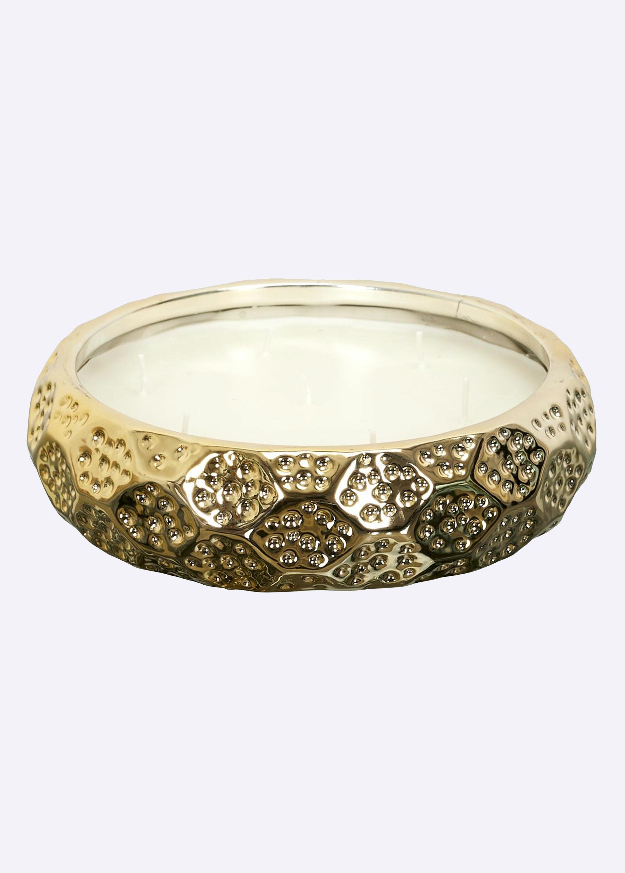 Vela_perfumada_en_un_recipiente_de_metal_martillado._7_mechas_FA1_slim