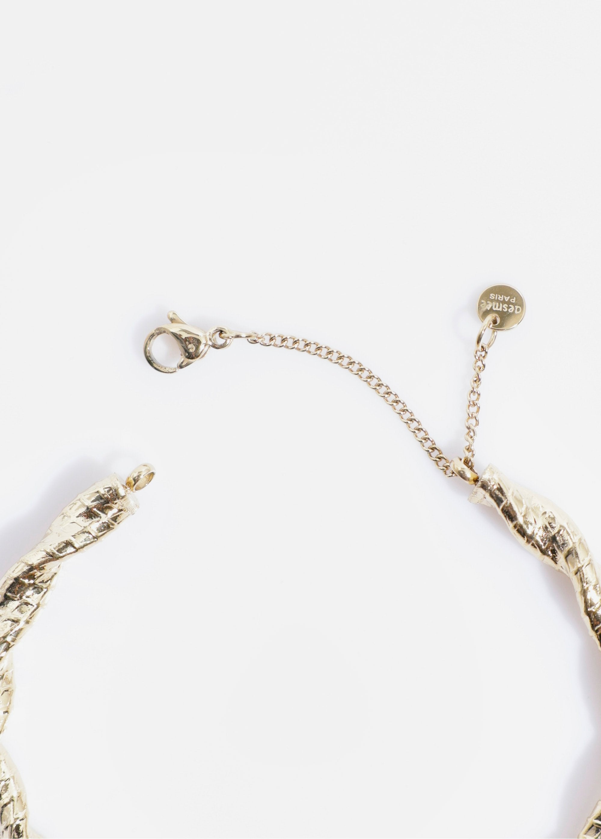 Anillo_rígido_de_acero_inoxidable_retorcido_Dorado_DE1_slim