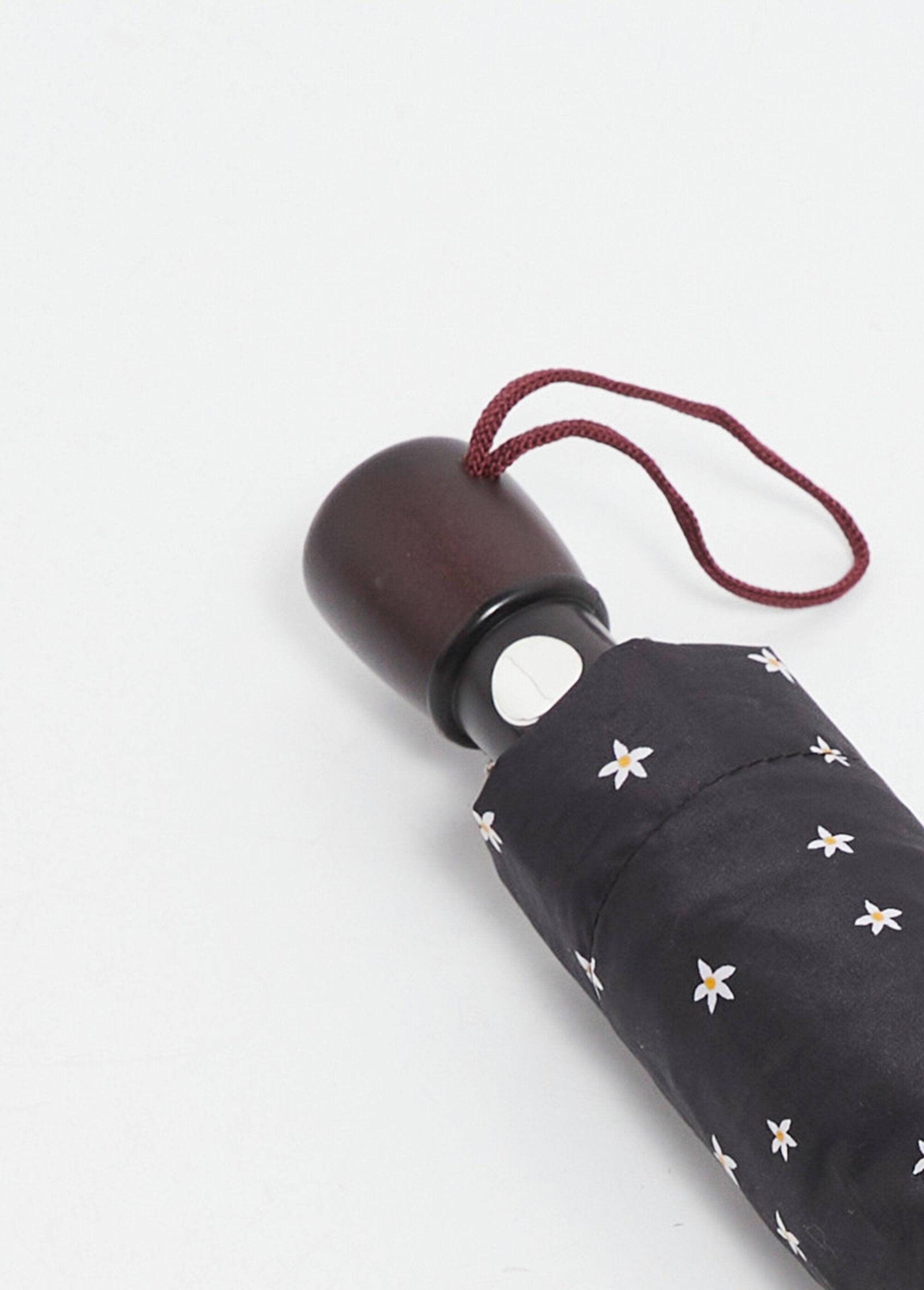 Paraguas_plegable_automático_de_lujo_Estrellas_blancas_y_negras_DE2_slim